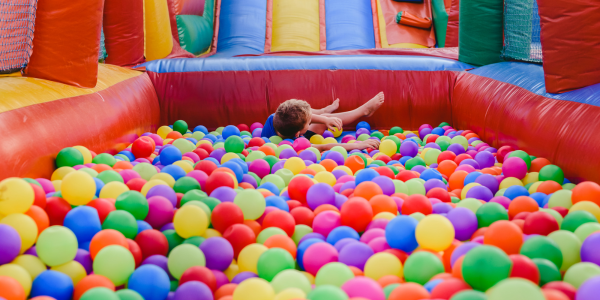 Kid in ball pit